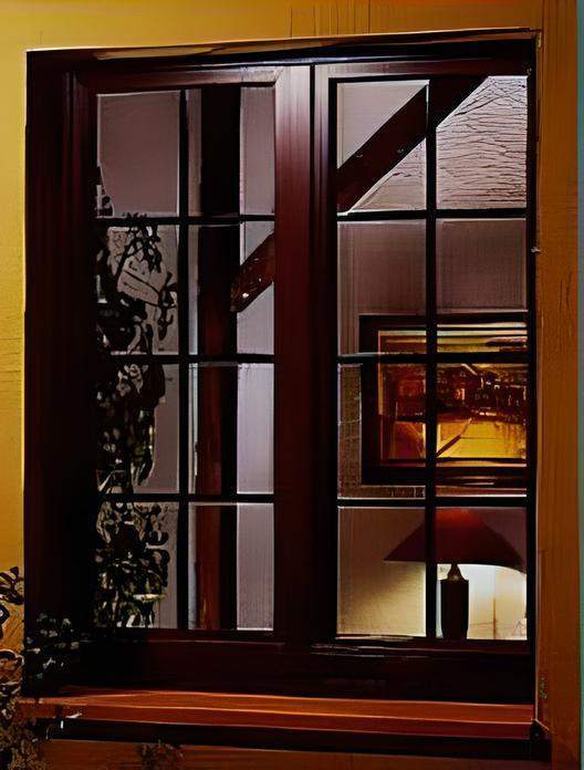 Fenêtre maison couleur marron Orne